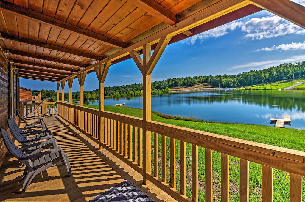 large porch overlooking a lake from a cabin in kentucky 