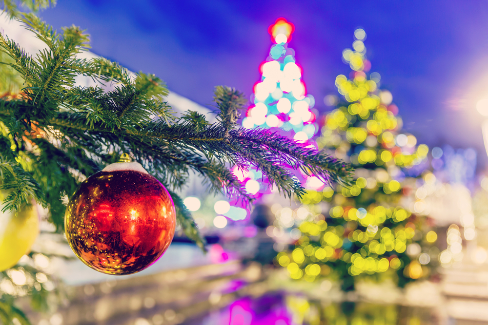 Christmas tree with lights and ornaments on them