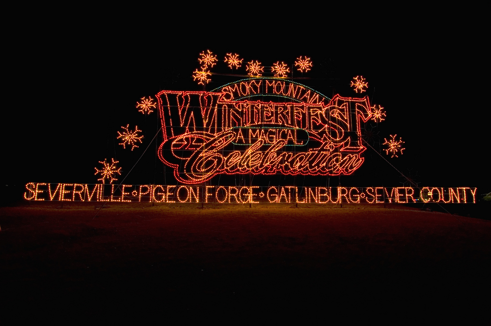 a sign made of Christmas lights that says "Winterfest"