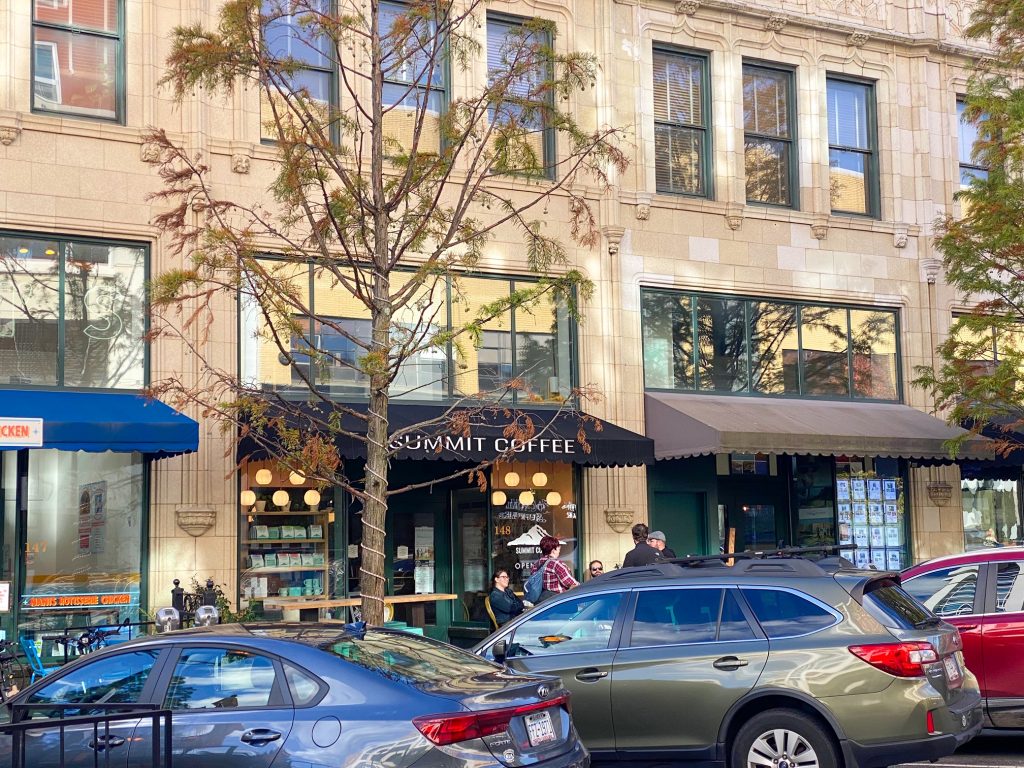 The outside of Summit Coffee on the street in an article about coffee in Asheville