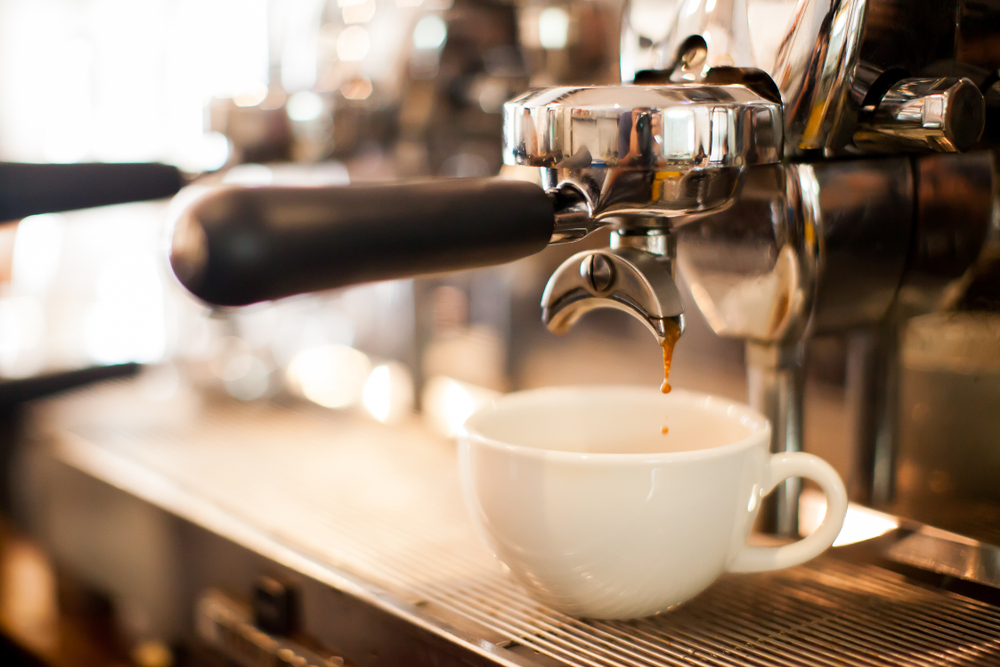 A coffee machine making an expresso