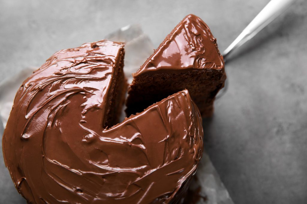 chocolate cake with a slice being taken out restaurants in Richmond