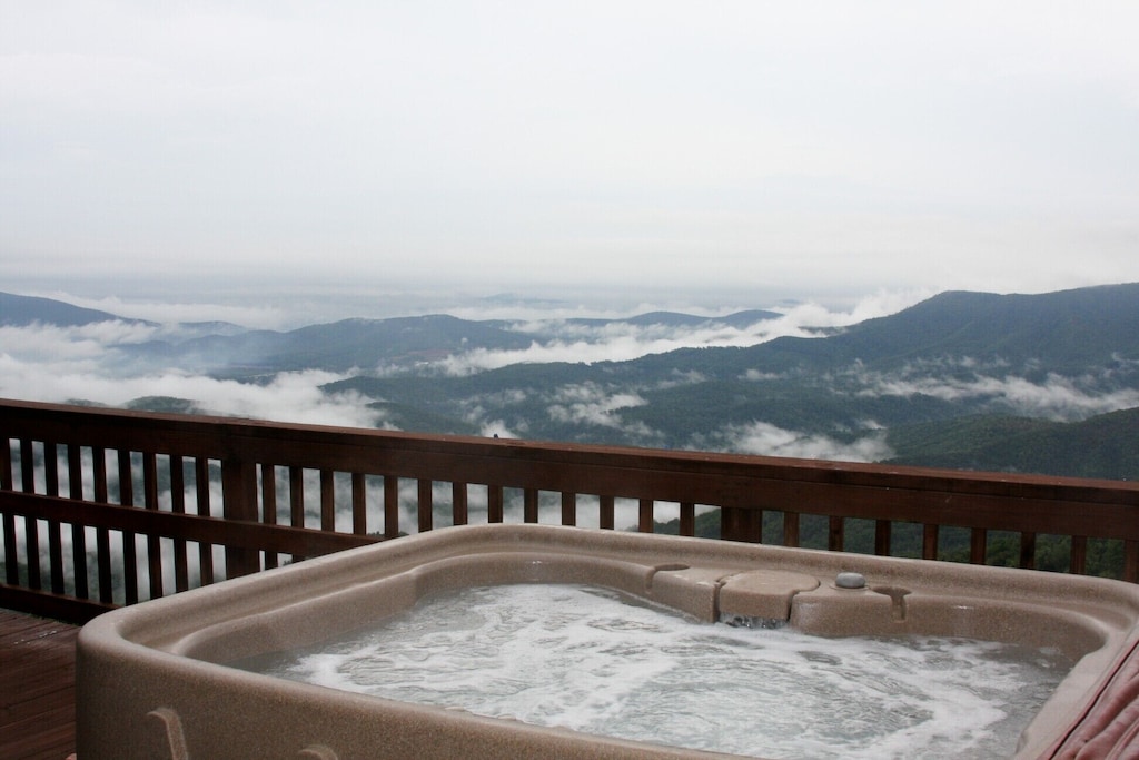 hot tub overlooking a view of the mountains where you can stay when looking where to stay in little switzerland