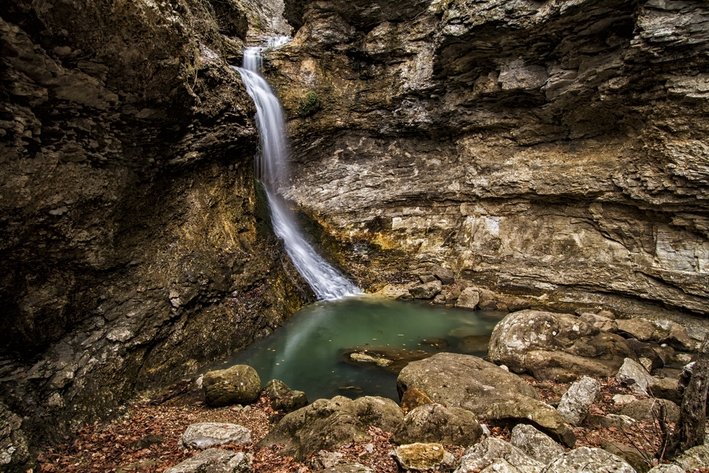 Eden Falls cascading down among rocks.