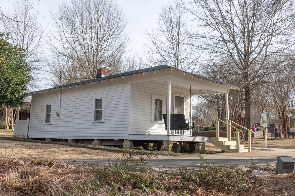 Outside of the small, white Elvis Presley Birthplace and Museum, one of the best things to do in Mississippi.