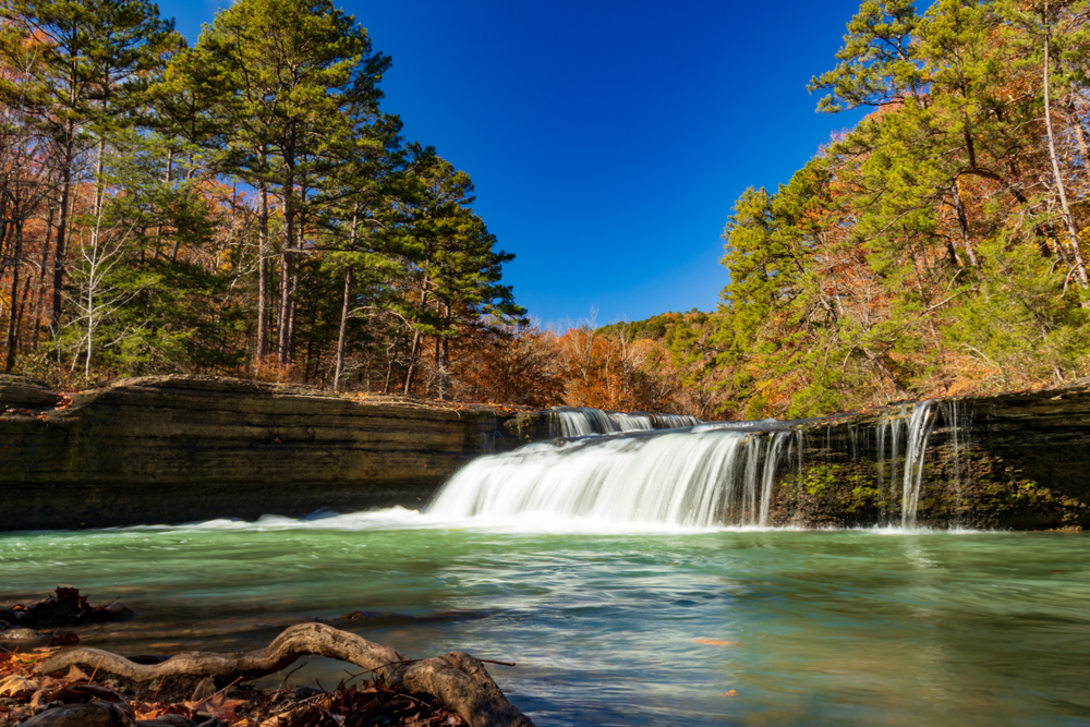 Low angle shot of Haw Creek Falls in the fall.