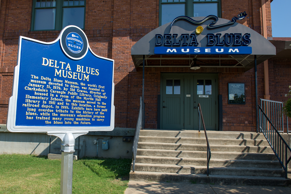 Entrance to the Delta Blues Museum with a historic place marker.
