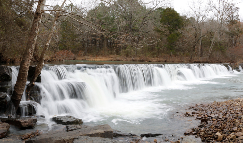 Natural Dam Falls stretching across the creek.