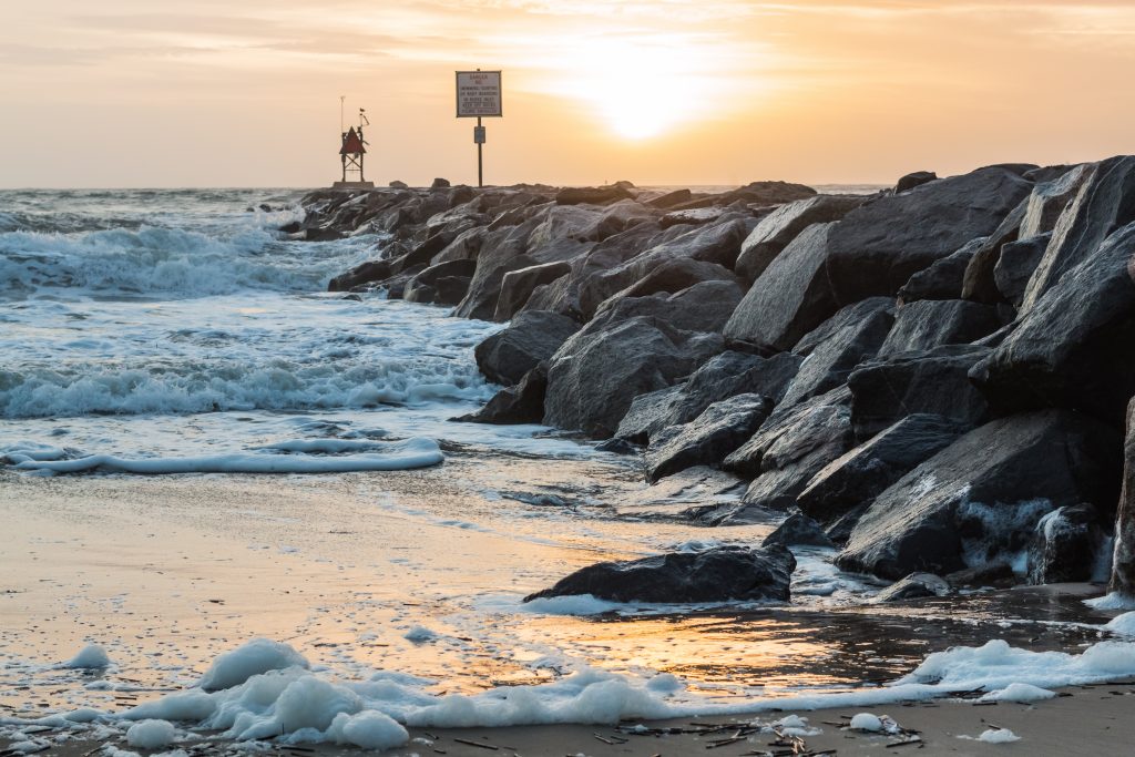 rocks, inlet, waves and foam beaches in virginia