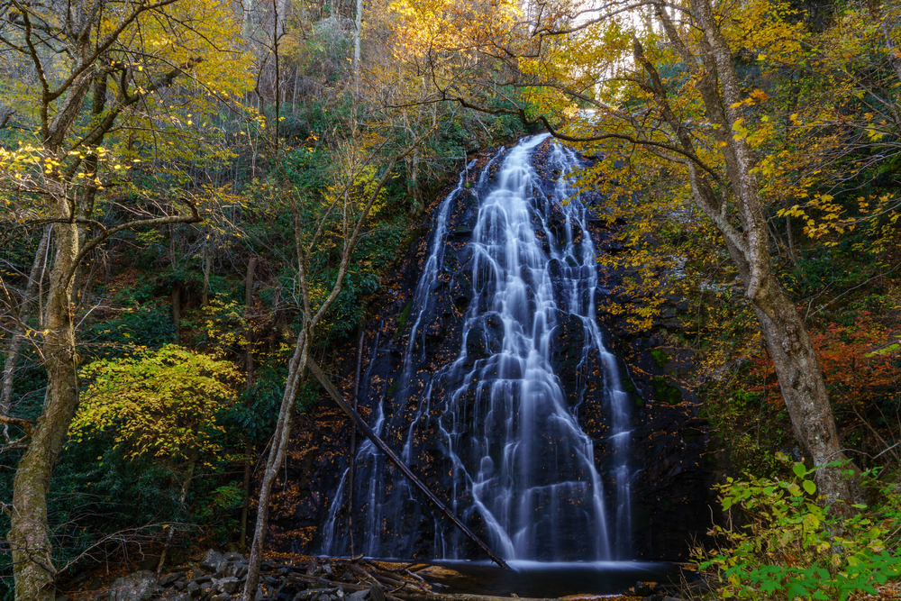 The 70 foot high Crab Tree falls one of the pretty waterfalls near Boone with leaves in fall changing