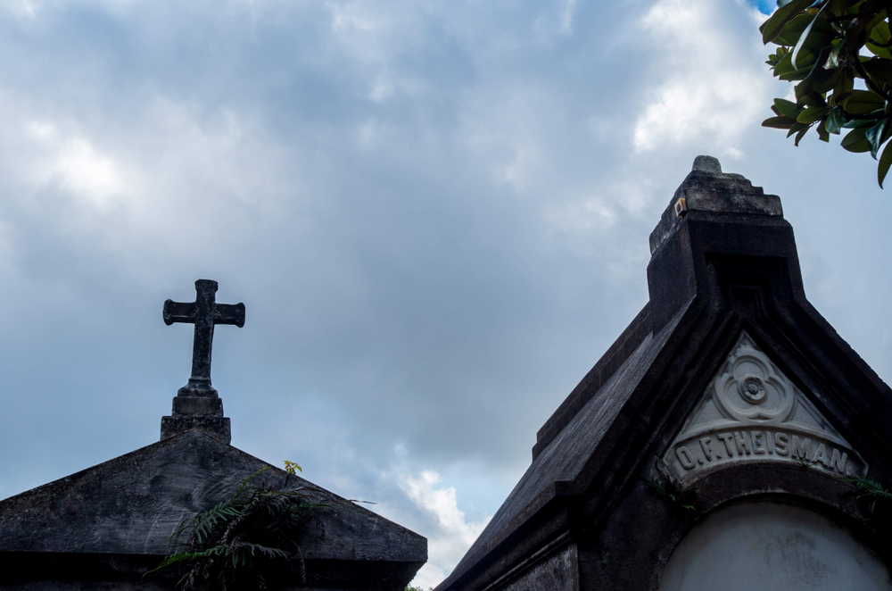 The roofs of two tombs in Lafayette Cemetery in New Orleans, where going on a ghost tour is one of the best things to do in Louisiana.