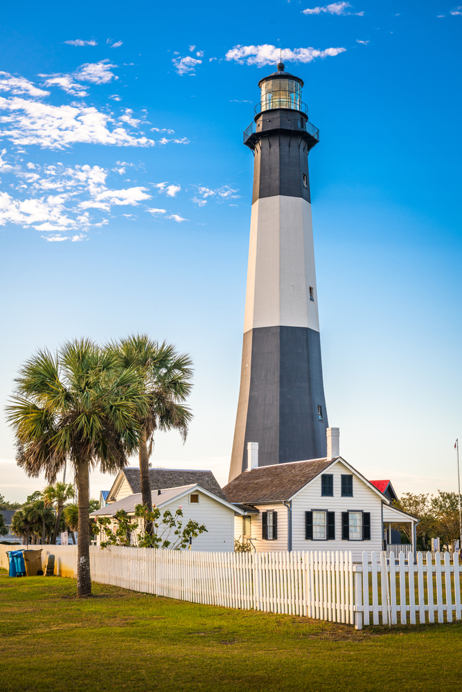 A light house on Tybee Island on a clear day.