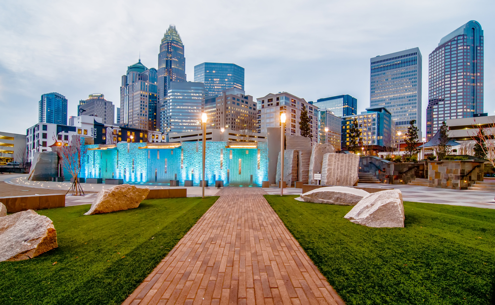 photo of a park structure in fornt of skyline in city