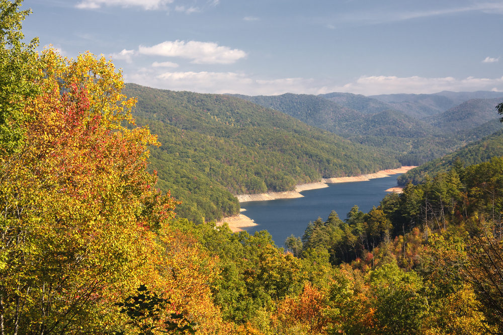 stunning photo of fontana lake from an overlook. mountains surrounding the lake