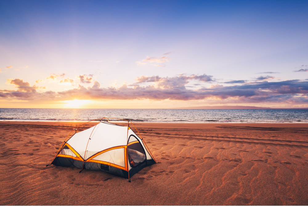 Camping on the beach at sunset is a great Louisiana vacation spot for outdoor lovers