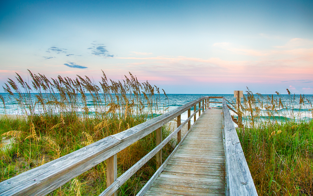 Sunset view along the boardwalk at one of the many beaches in North Carolina. 