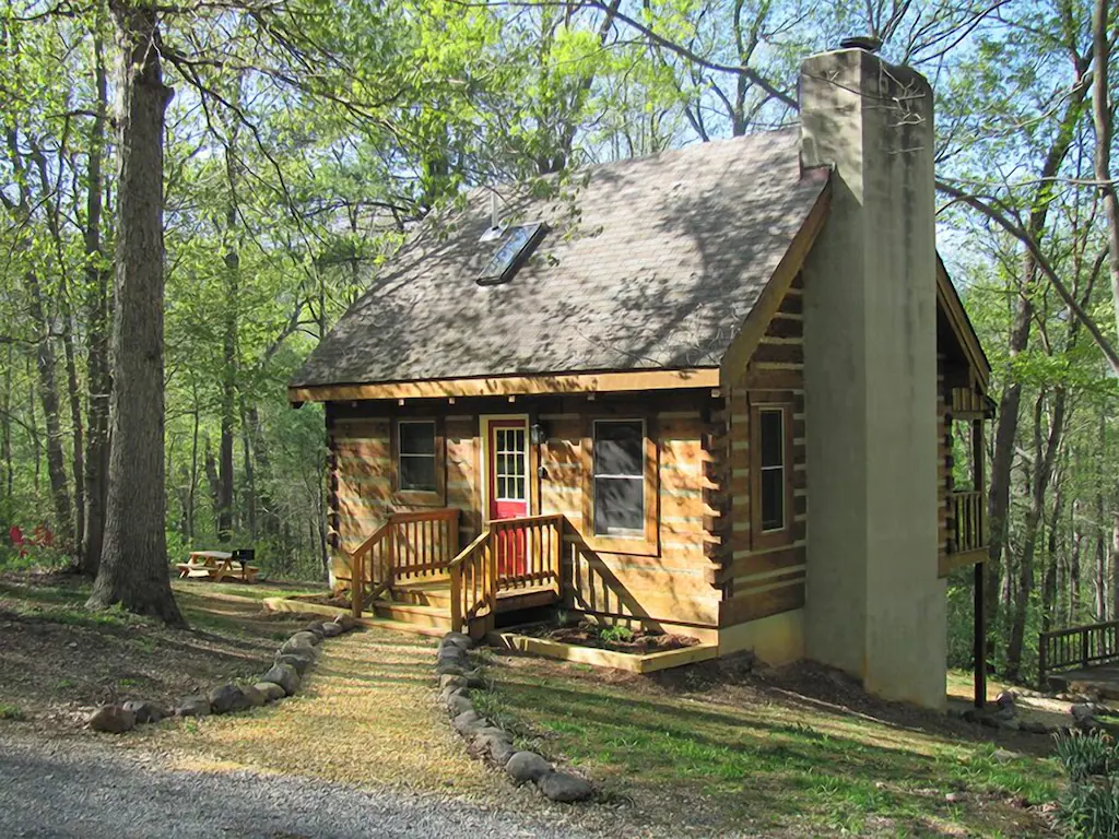 small Virginia cabin in the woods with chimney