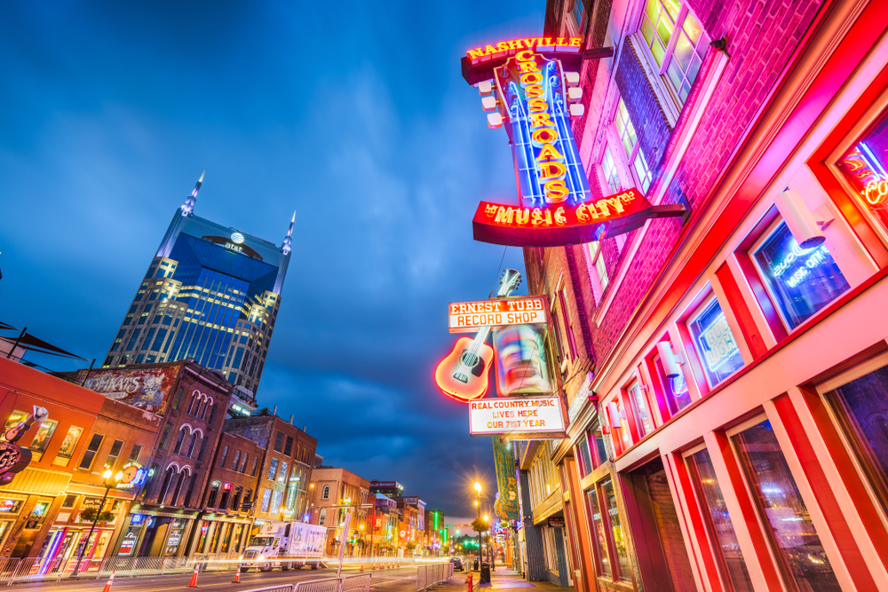 broadway at night with all the neon signs lit up