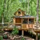 maple treehouse in tennessee surrounded by green trees