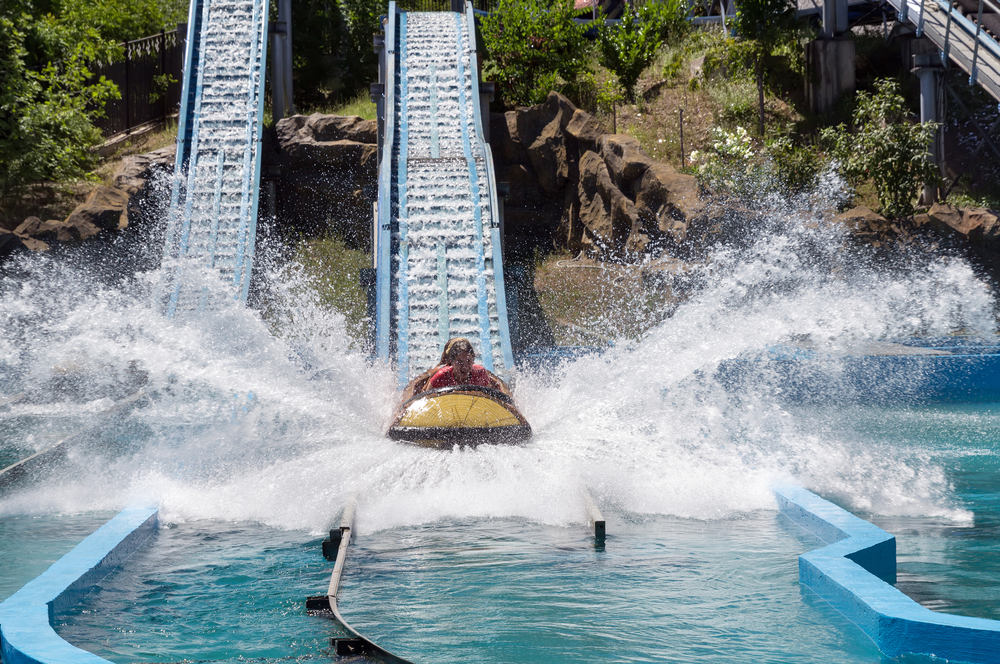 Water ride splashing down an incline into a pool of water at one of the amusement parks in Georgia. 