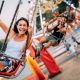 women riding on a swing ride at one of the best theme parks in the south USA