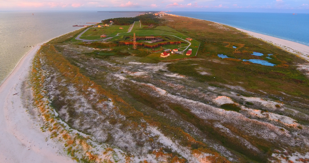 aerial photo of fort morgan and surrounding beaches