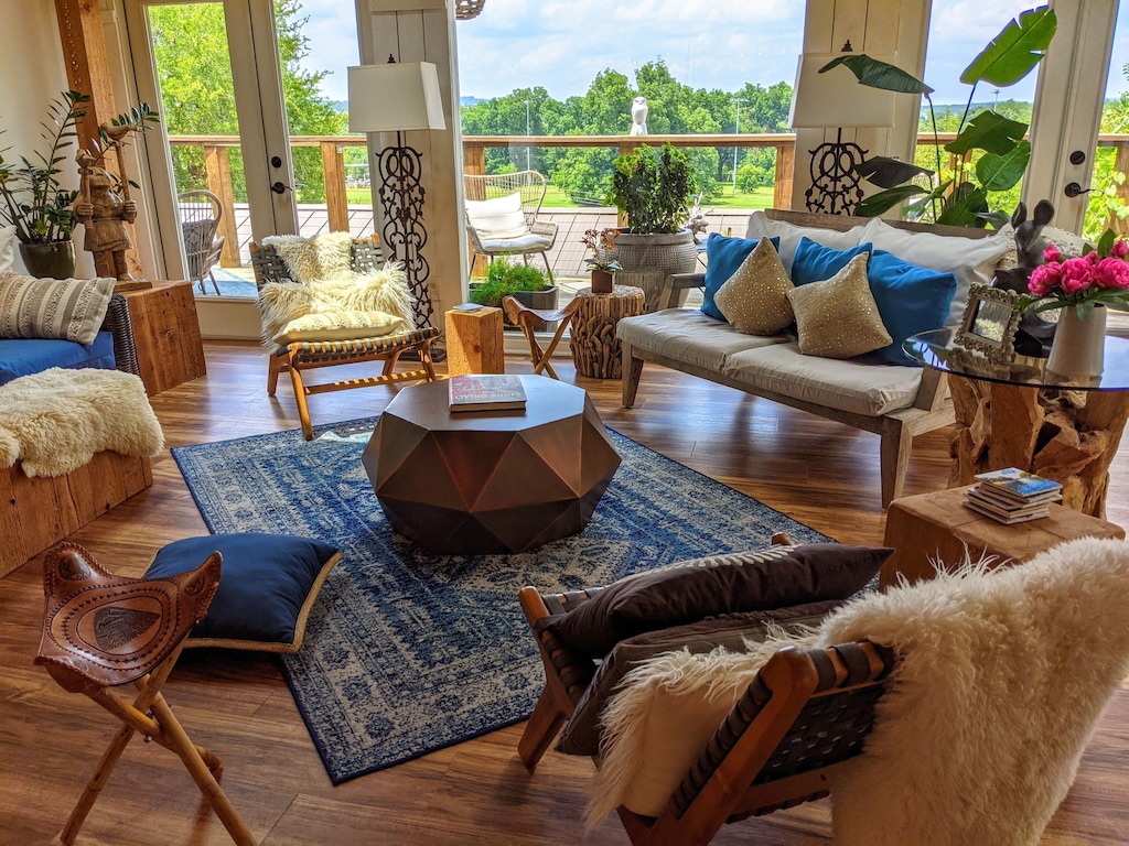 View of the boho chic living area and patio of the Texas Year Round Oasis VRBO. 