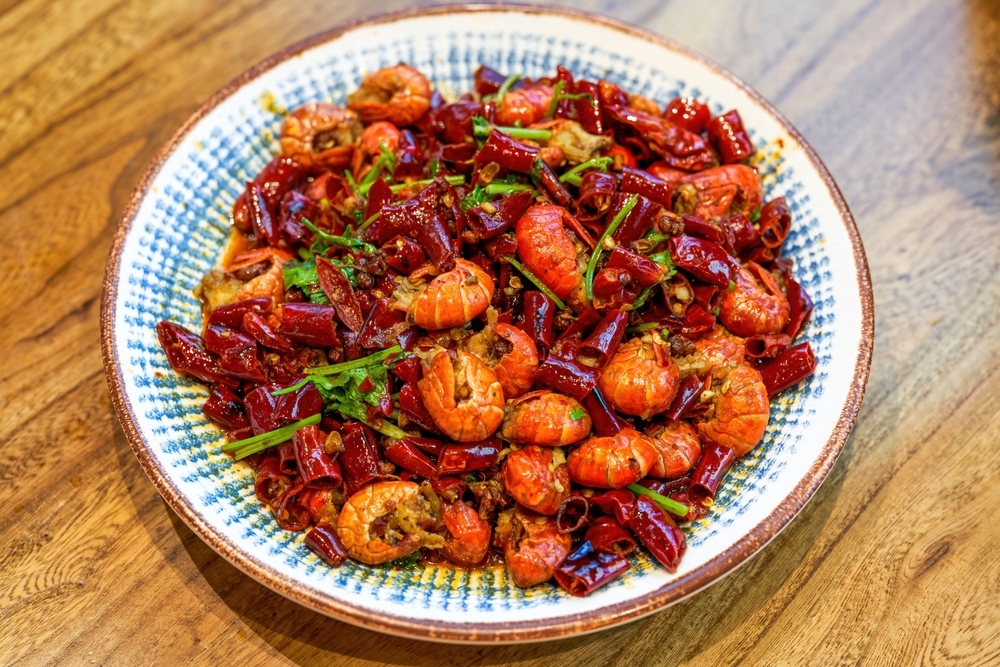  Crawfish tails in a bowl with chilli in an article about restaurants in Shreveport. 