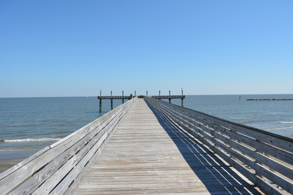 View of water and boardwalk at Grand Isle State Park.