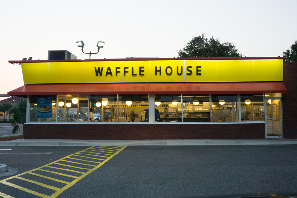 The front of a classic style Waffle House restaurant. 