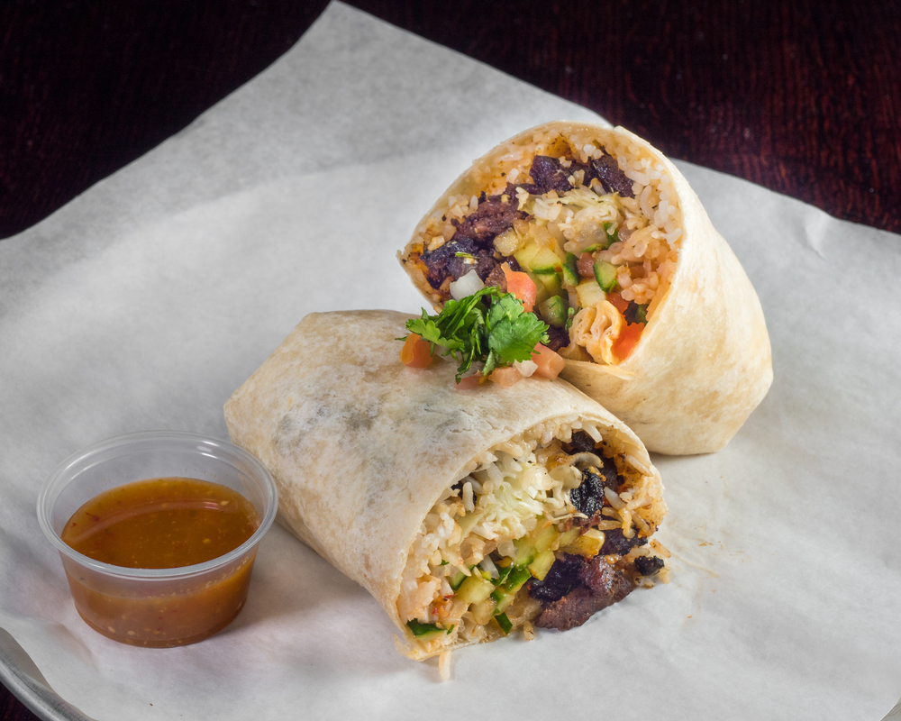 A vegan burrito full of rice and veggies, like the one served at Gnome Cafe during breakfast in Charleston.