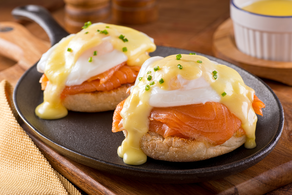 English muffins, smoked salmon lox, a poached egg and creamy yellow hollandaise sauce. The perfect eggs benedict you must try when you eat breakfast in Atlanta. 