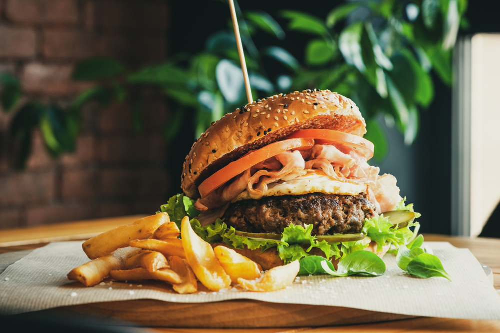 Traditional American cuisine like this burger and fries are popular quick bites at some of the  best restaurants in San Antonio.