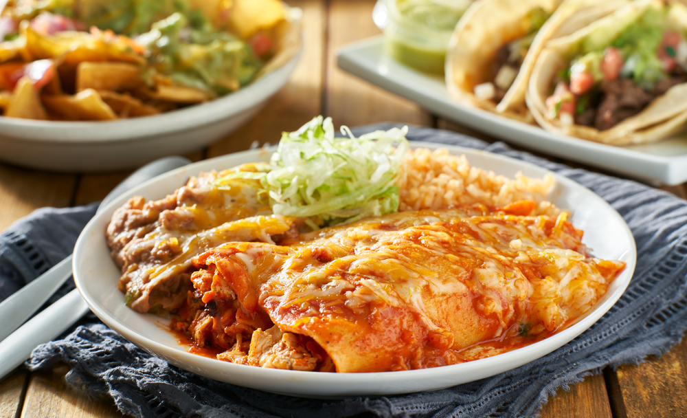 Enchilada plates like this one can be found in some of the best restaurants in San Antonio because of the demand of Texas-Mexican cuisine.