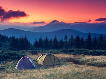 people camping in the blue ridge mountains near asheville at sunset