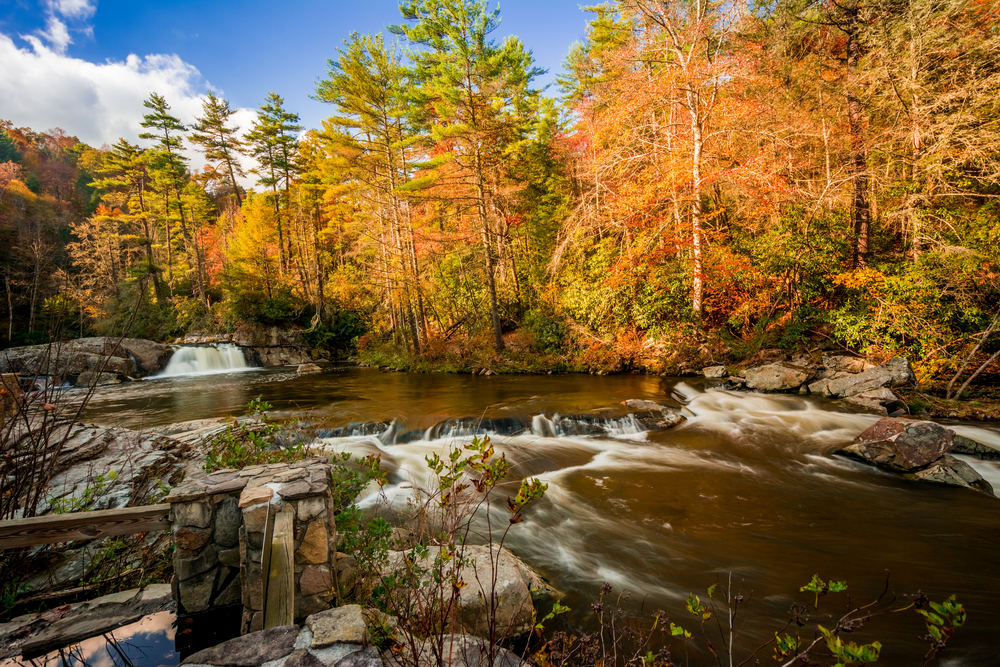 linville falls in north carolina with fall foliage