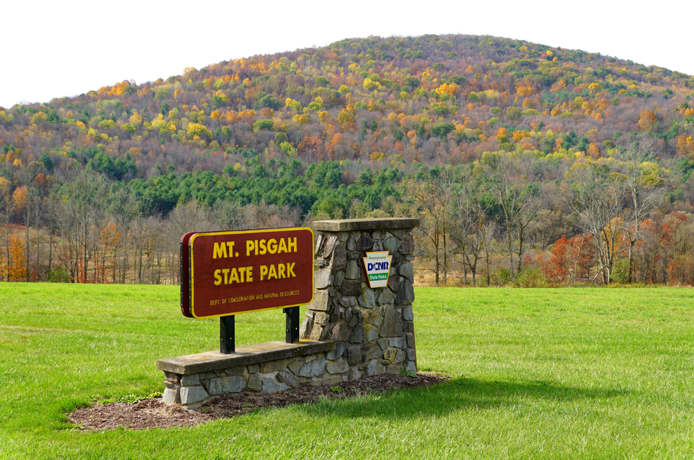 Sign at the entrance to mt. pisgah state park, one of the best camping sites near asheville