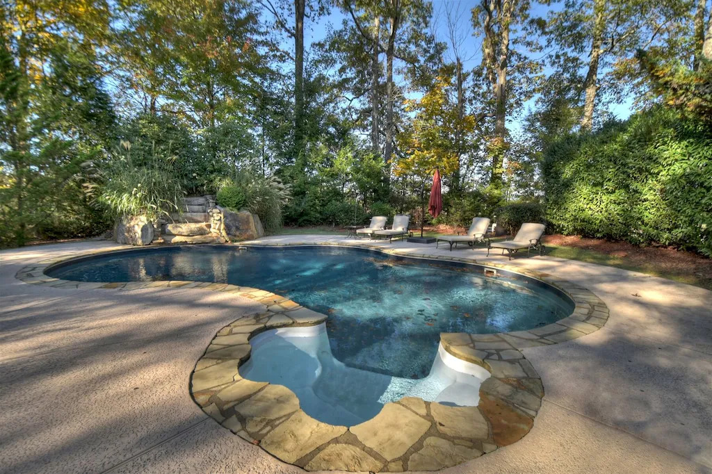 Photo of the pool at the Moonlight Retreat, one of the greatest luxury cabins in Georgia with a swimming pool!