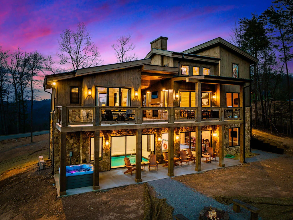 photo of outside of one of the most insane luxury cabins in tennessee, two floors with hot tub outside
