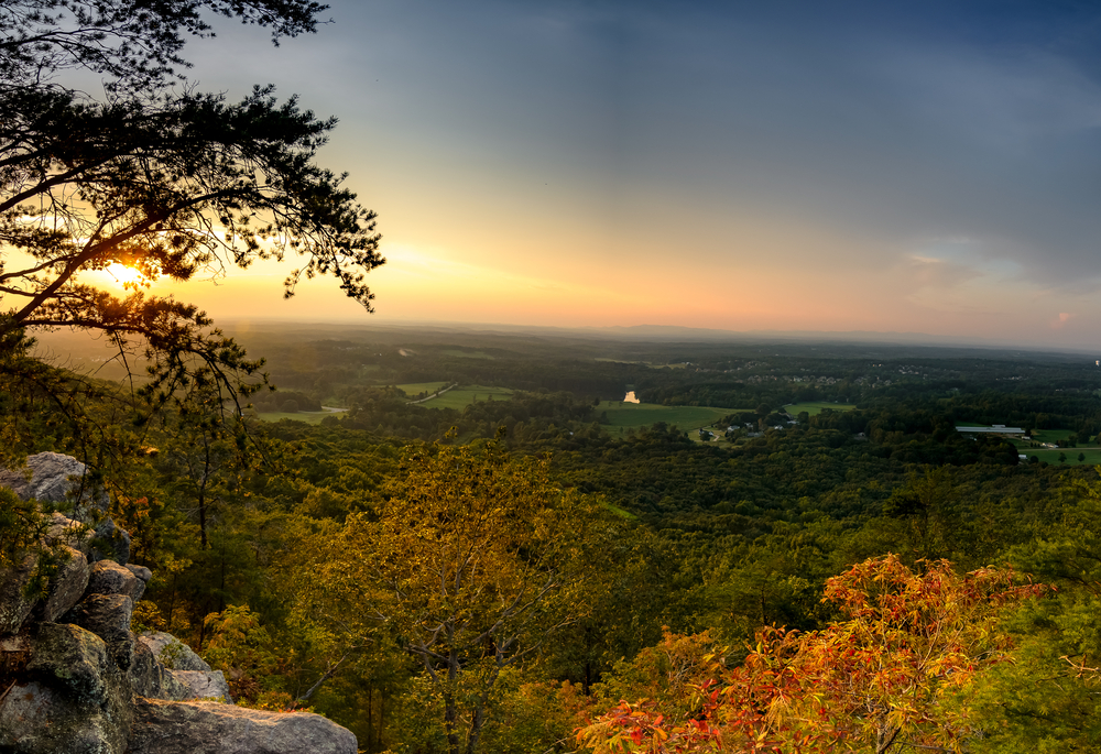 Photo of the sunset over Sawnee Mountain, one of the best places to visit in North Georgia. 