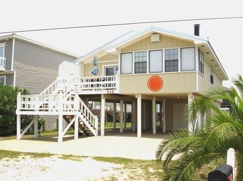 View of the welcoming front porch of the pet friendly gulf shores VRBO