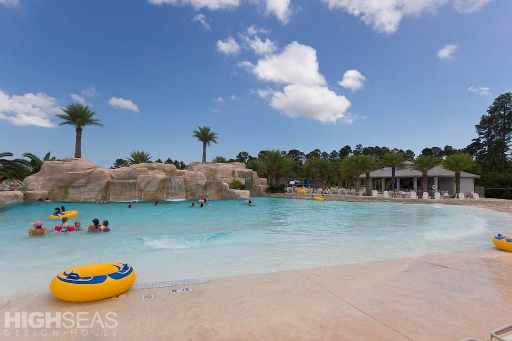 view of the beautiful pool with waterfalls of the lazy river condo 