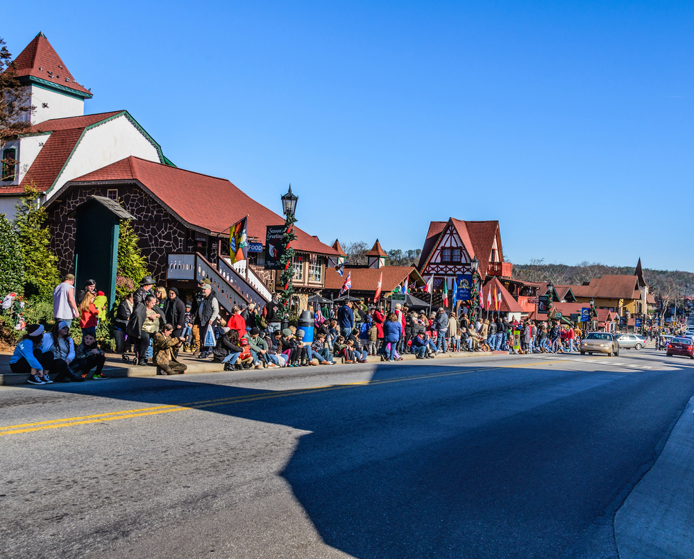 people lined on the streets of helen georgia at christmas time 