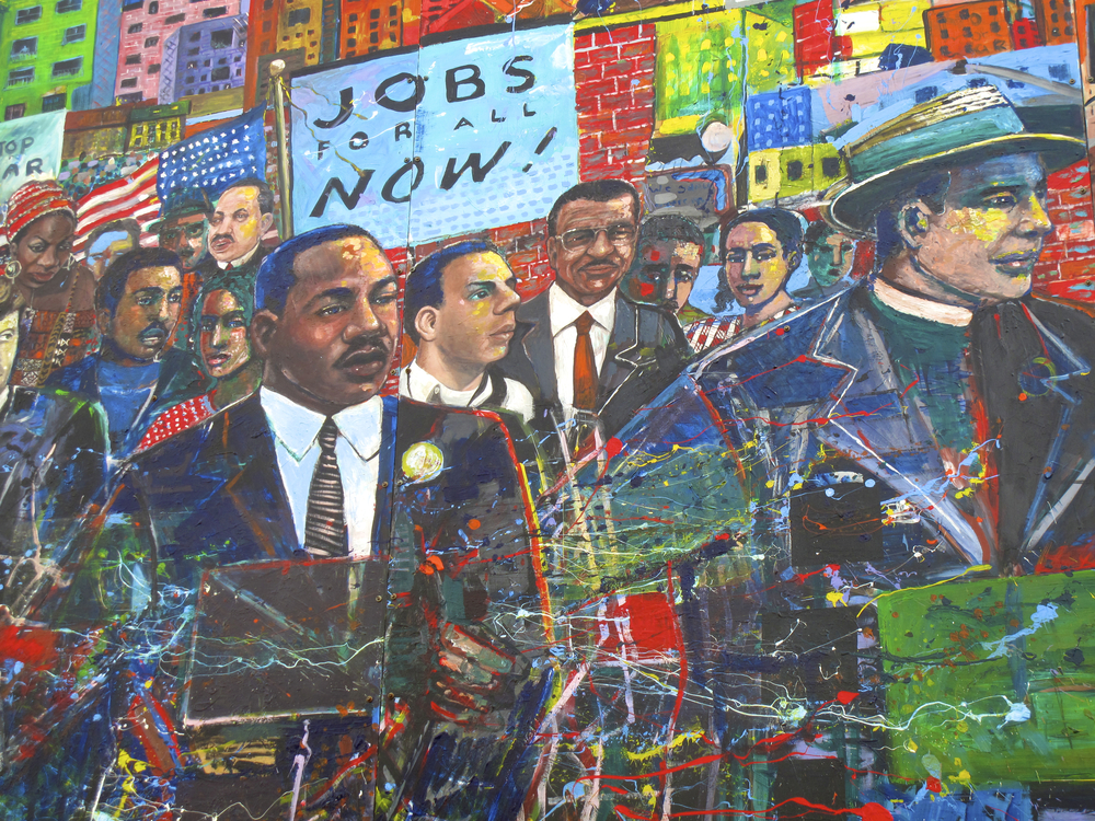 The Living Walls of Atlanta feature murals like this one-- MLK marching for rights for everyone, including jobs-- and are all over the city. Finding these murals is one of the fun and free things to do in Atlanta. 