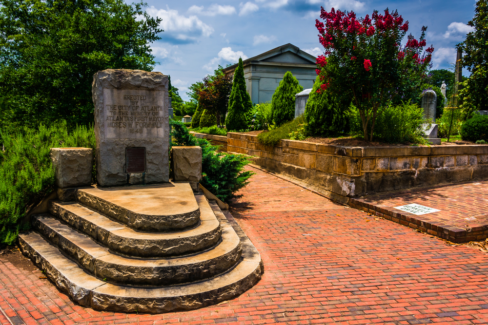 The Oakland Cemetery is one of those free things to do in Atlanta that is filled with history: this photo shows the botanical gardens in bloom with headstones. 