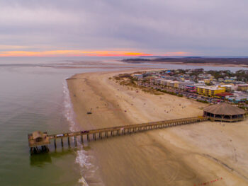 tybee island beach pier from above at sunset