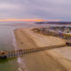 tybee island beach pier from above at sunset
