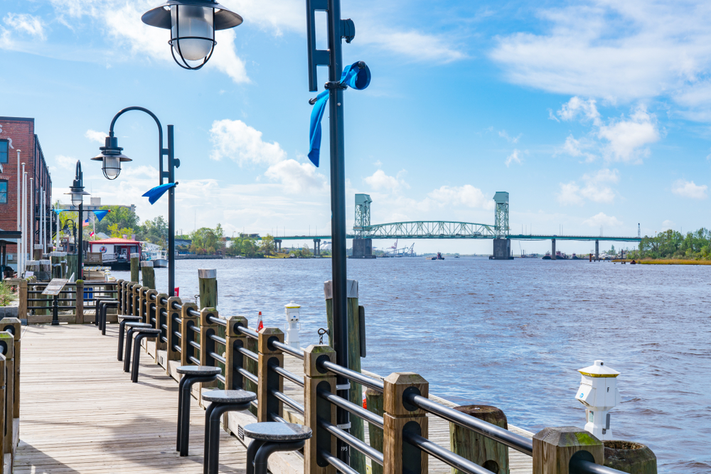 Riverwalk along the waterfront of the Cape Fear River, one of the best things to do in Wilmington NC.