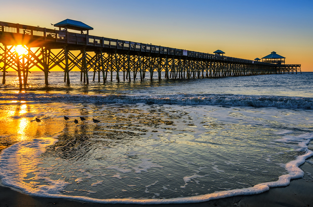 The long pier that juts into the ocean during sunset at Follys Beach makes it one of those beach towns in South Carolina to remember. 