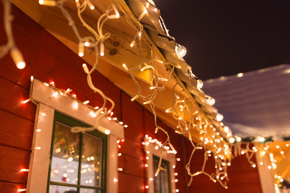 christmas lights hanging from roof of store at christmas in north carolina